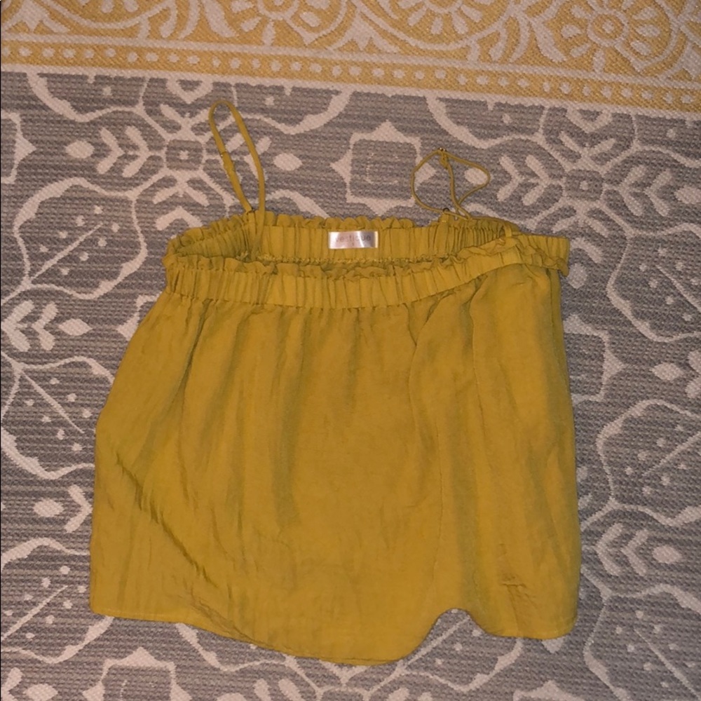Neutral yellow (gold) ruffle tank